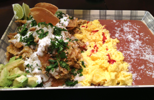 Chilaquiles with Scrambled Eggs and Refried Beans